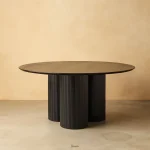 OrbitWood Round Dining Table – handcrafted solid wood table with smooth circular top and natural wood grain, perfect for dining rooms or breakfast nooks.