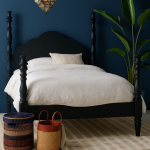 NaviThrone Bed – solid wood bed with tall modern headboard and bold, throne-like structure.