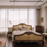 Celeste Cane Bed with curved wooden headboard and footboard, natural cane panels, carved detailing, and king size 72 × 78 inches.